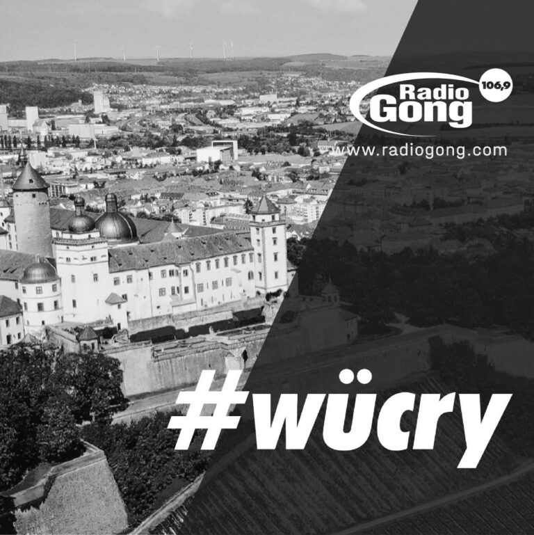 Logo von Radio Gong über einer Ansicht von Würzburg